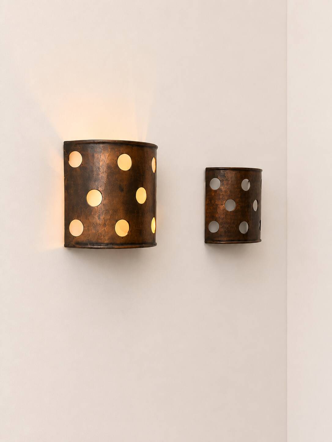 Pair of vintage wall sconces, hammered copper, France, 1970.
