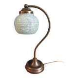 Bedside lamp in room with patinated golden globe Clichy blue
