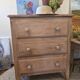 Small Parisian-style chest of drawers patinated in pink.