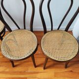 4 antique curved wood and cane chairs