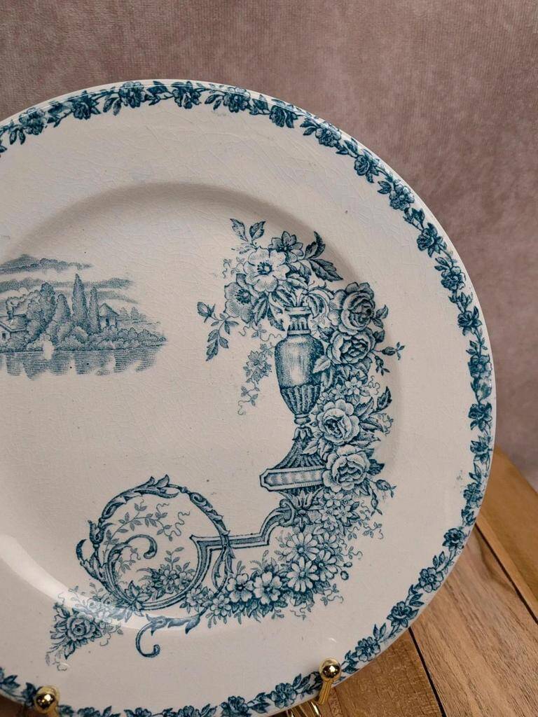 Dessert plate in ironstone Clairefontaine model Buffon blue with old landscape decoration.