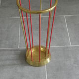 Porte parapluie doré et rouge