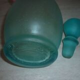 Transparent blue decanter with bubbles