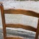 Vintage chair in carved solid wood and velvet fabric.