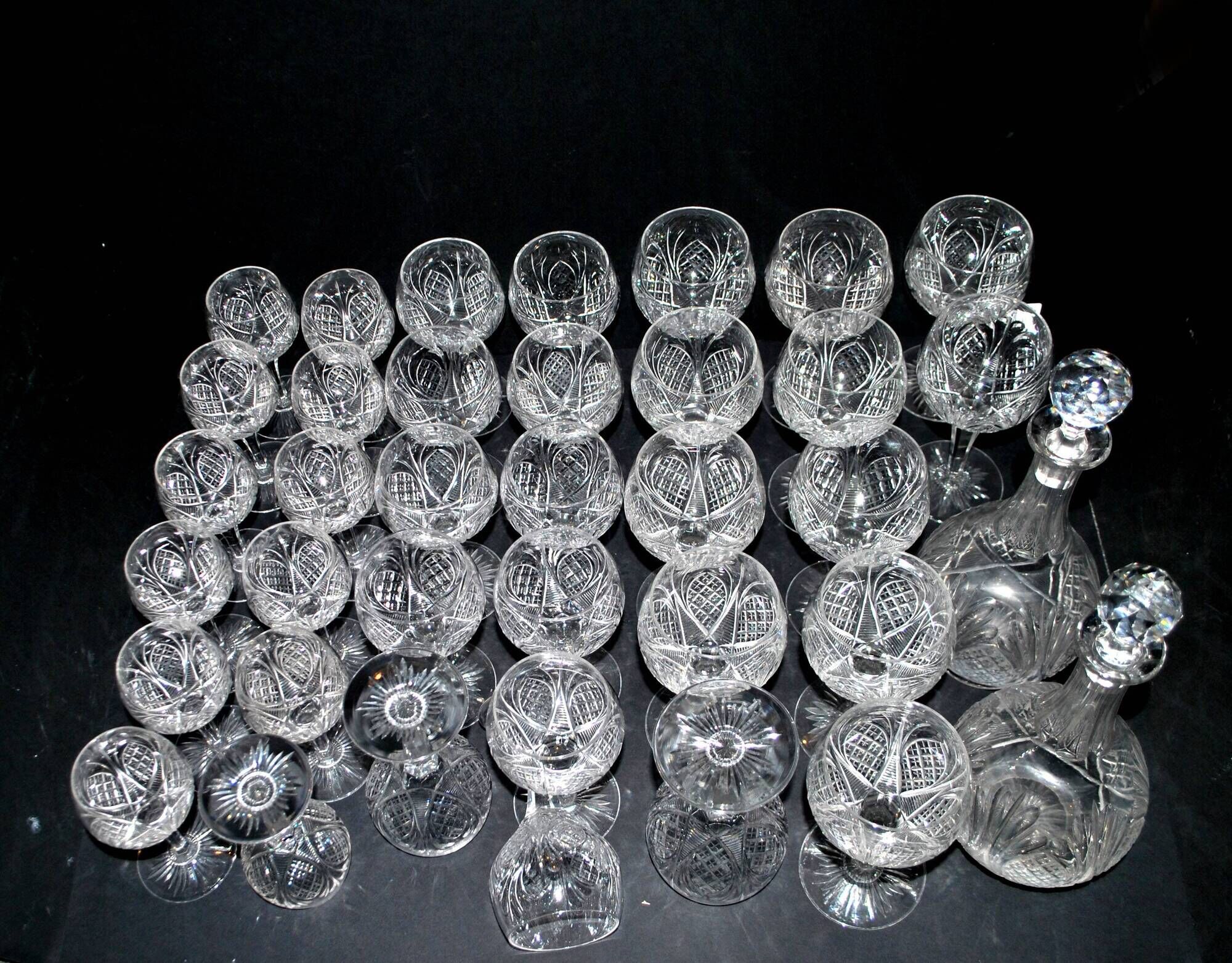 Baccarat set of 35 crystal glasses + 2 flower model carafes 9157 from 1907