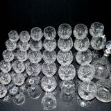 Baccarat set of 35 crystal glasses + 2 flower model carafes 9157 from 1907