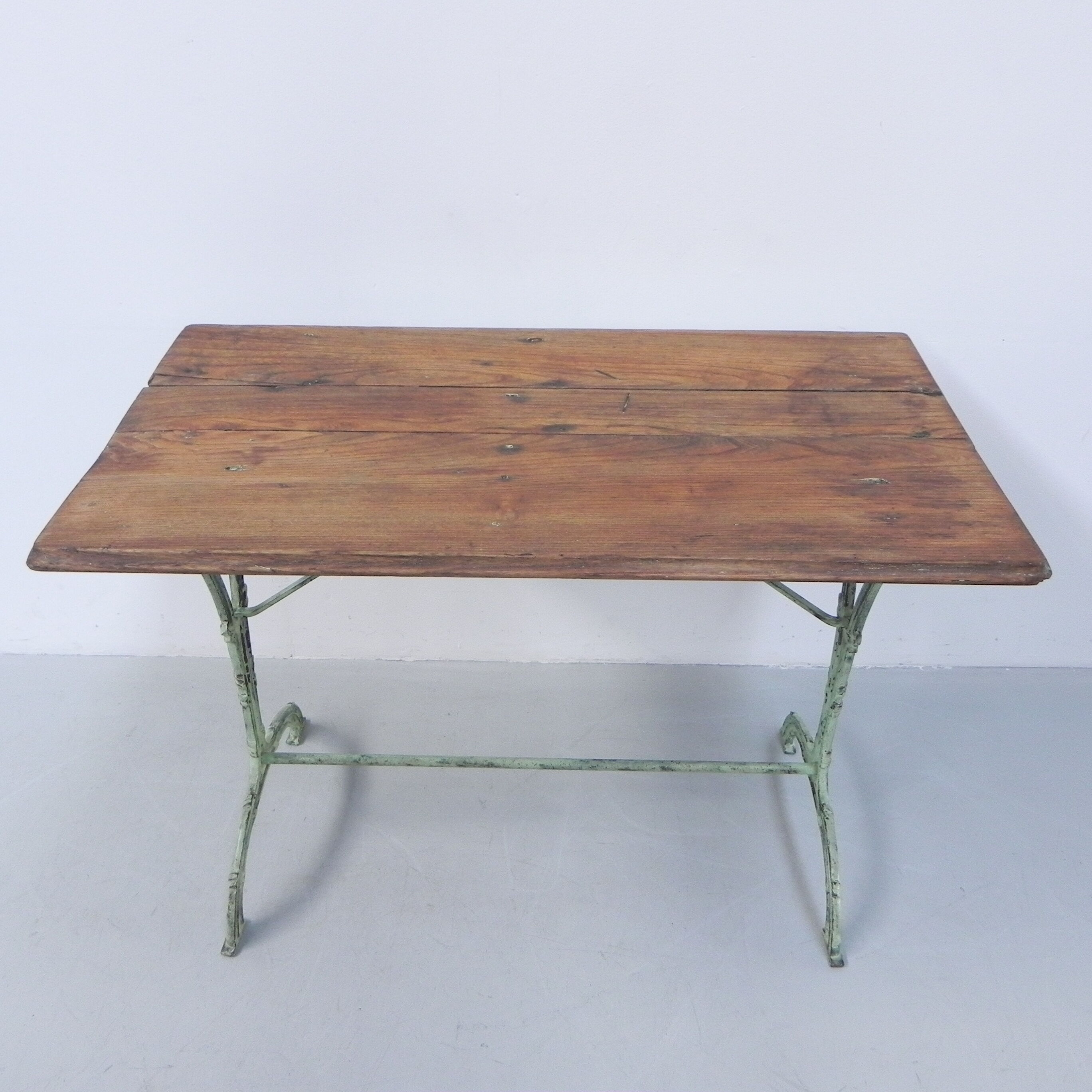 Art nouveau bistro table with cast iron frame