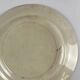 Round plate made of iron earth from Salins, late 19th century - early 20th century.