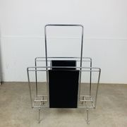 Chrome and black leather magazine rack, 1970s.