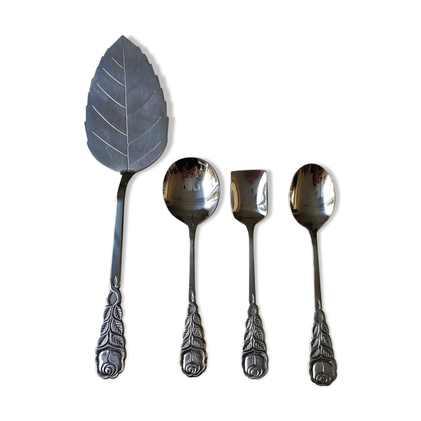 Stainless steel dessert/coffee service with 18 pieces. Rostfrei. Pink shape