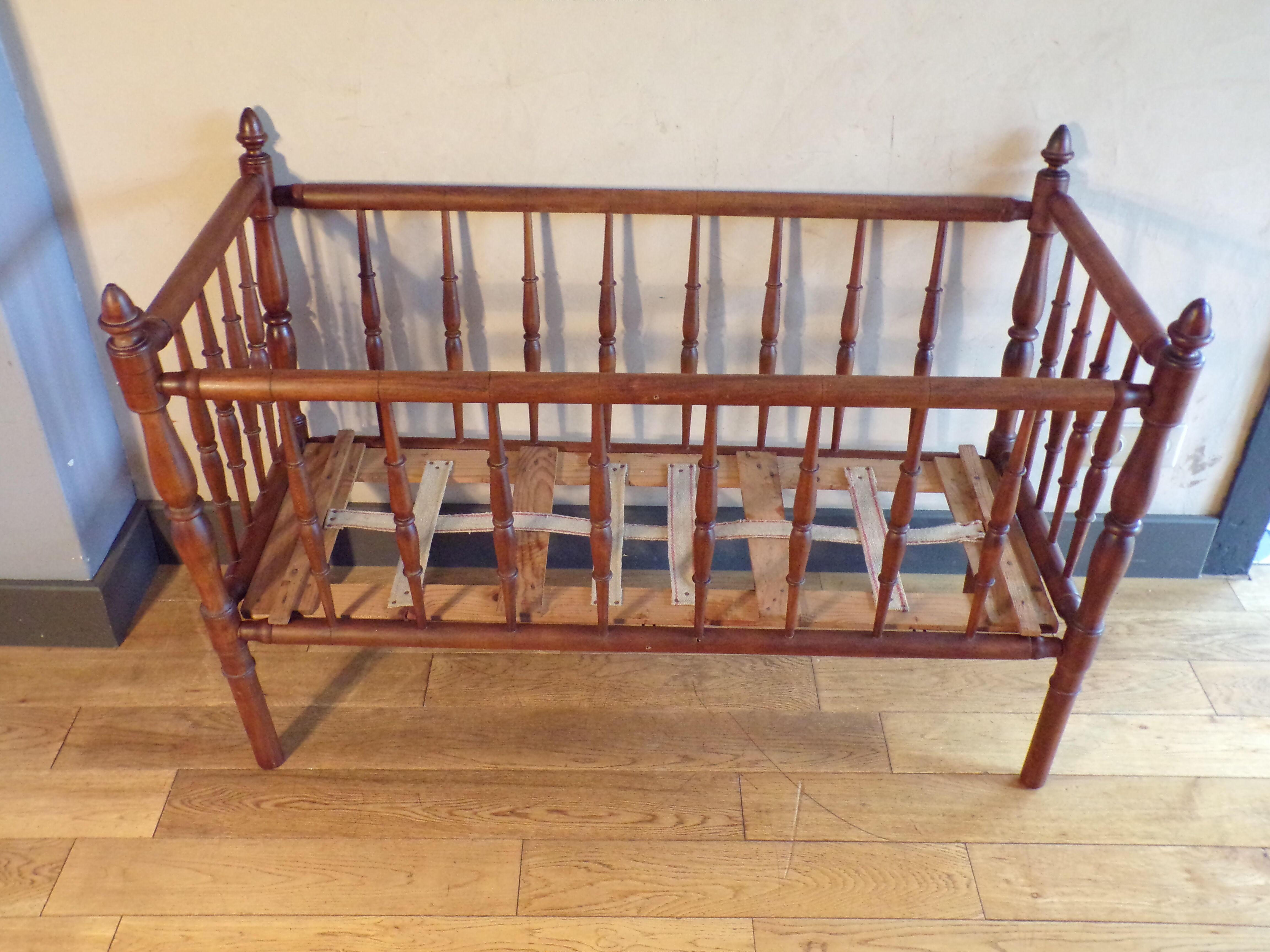 Vintage wooden child bed turned