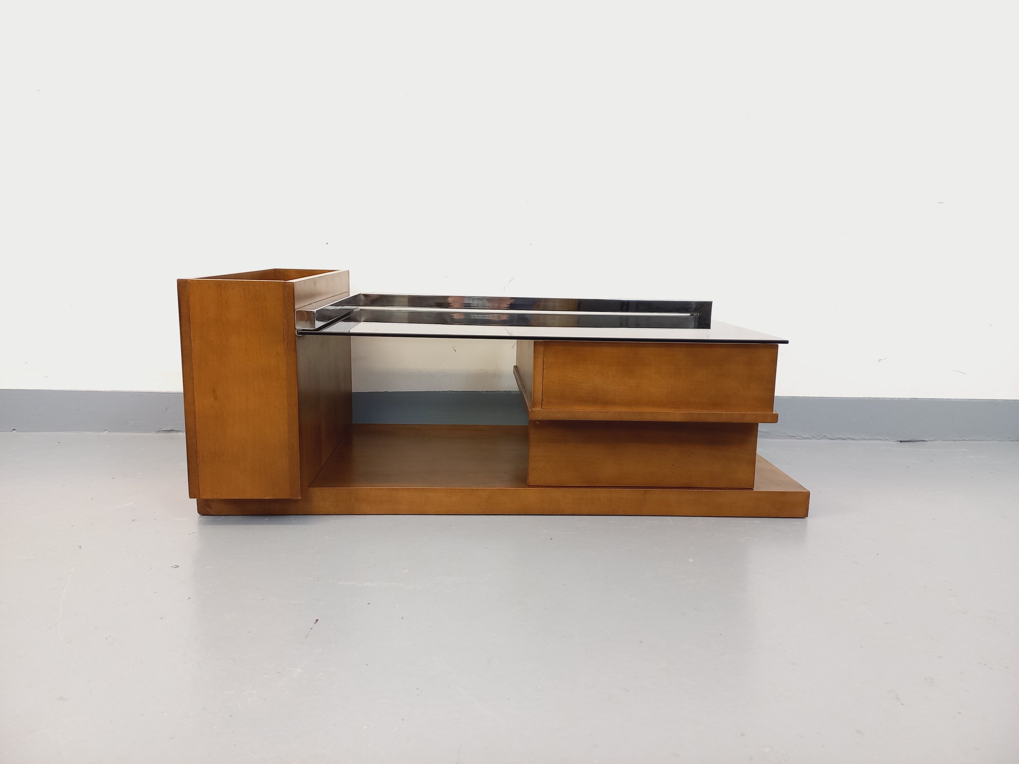 Rectangular vintage modernist coffee table with wooden niches, chrome.