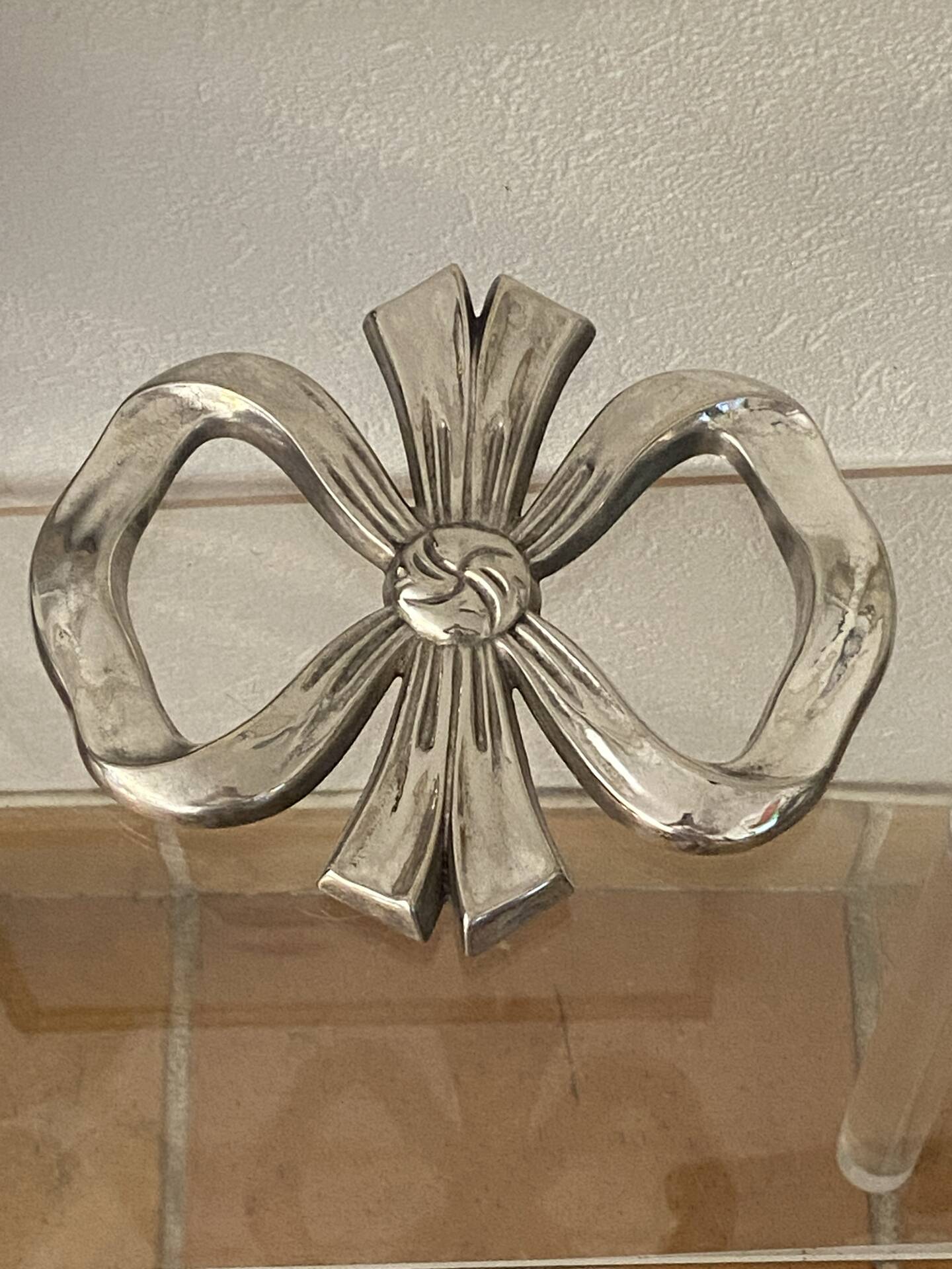 Lancel trivet, bow and ribbon, silver-plated metal