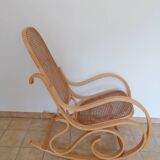 Wooden and cane rocking chair