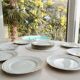 Set of 12 flat plates made of Limoges porcelain