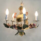 Painted metal chandelier decorated with pink and foliage with 5 lights. Year 80 90