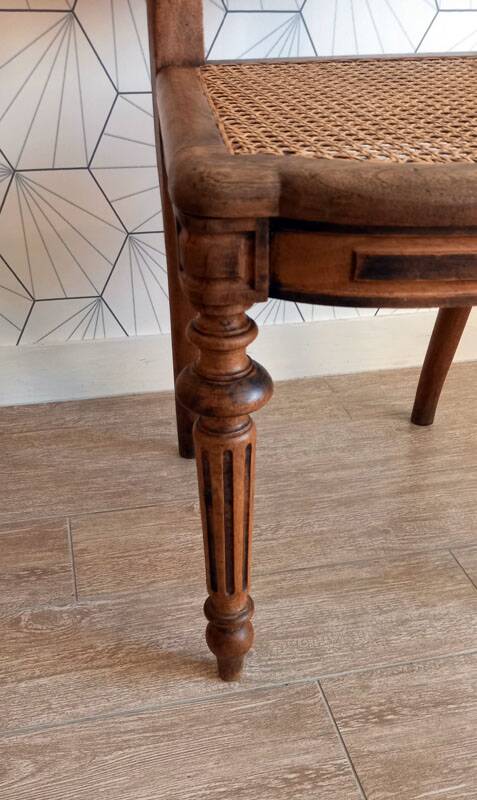 Solid oak art deco chair with cane and fabric.