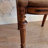 Solid oak art deco chair with cane and fabric.