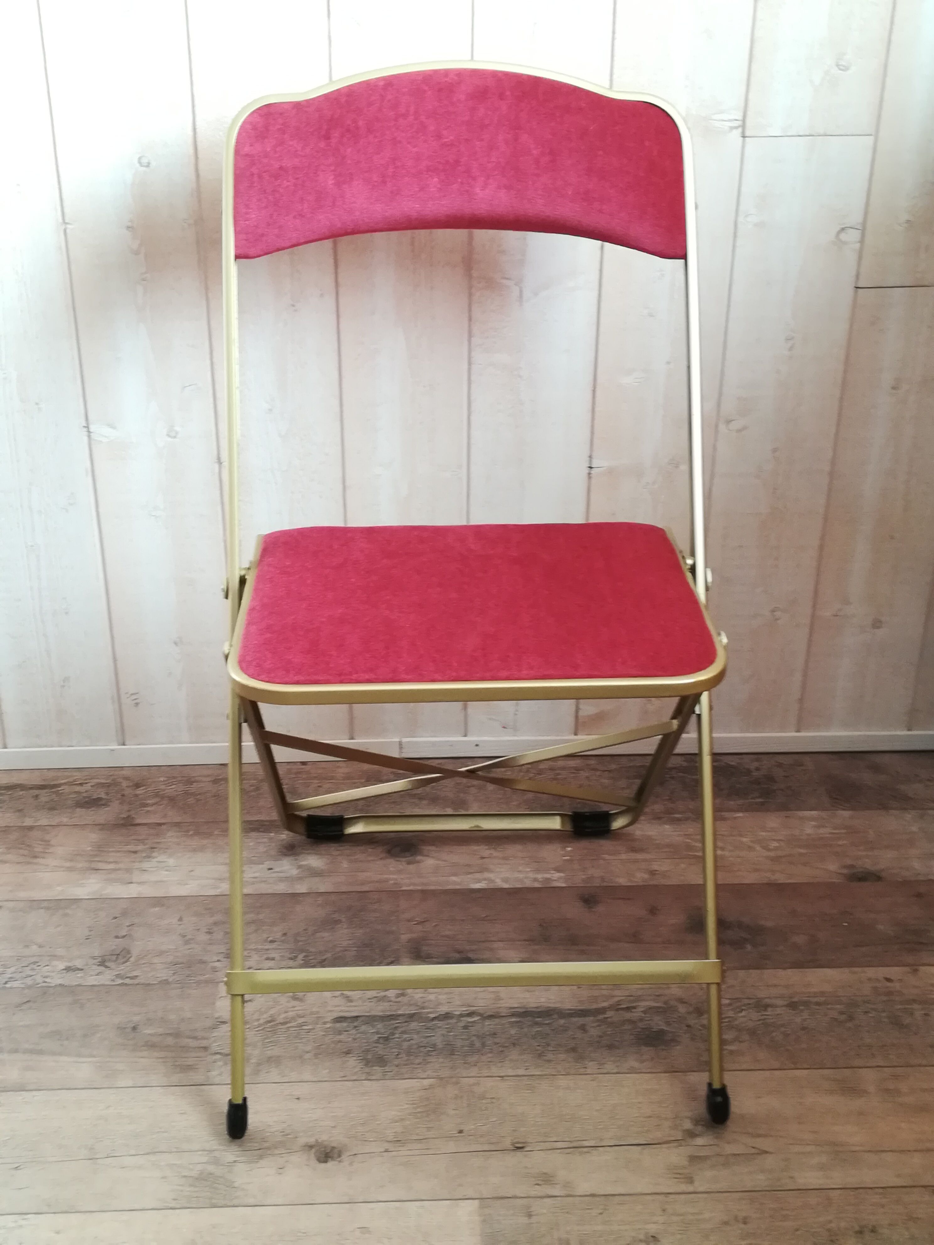 Pink velvet folding chair