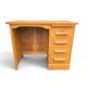 Vintage oak desk with a drawer unit and sliding shelf.