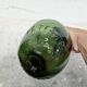 Oval green demijohn