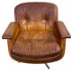 Paire de fauteuils pivotants vintage en cuir cognac par Eugen Schmidt