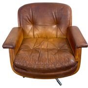 Pair of vintage cognac leather swivel lounge chairs by Eugen Schmidt