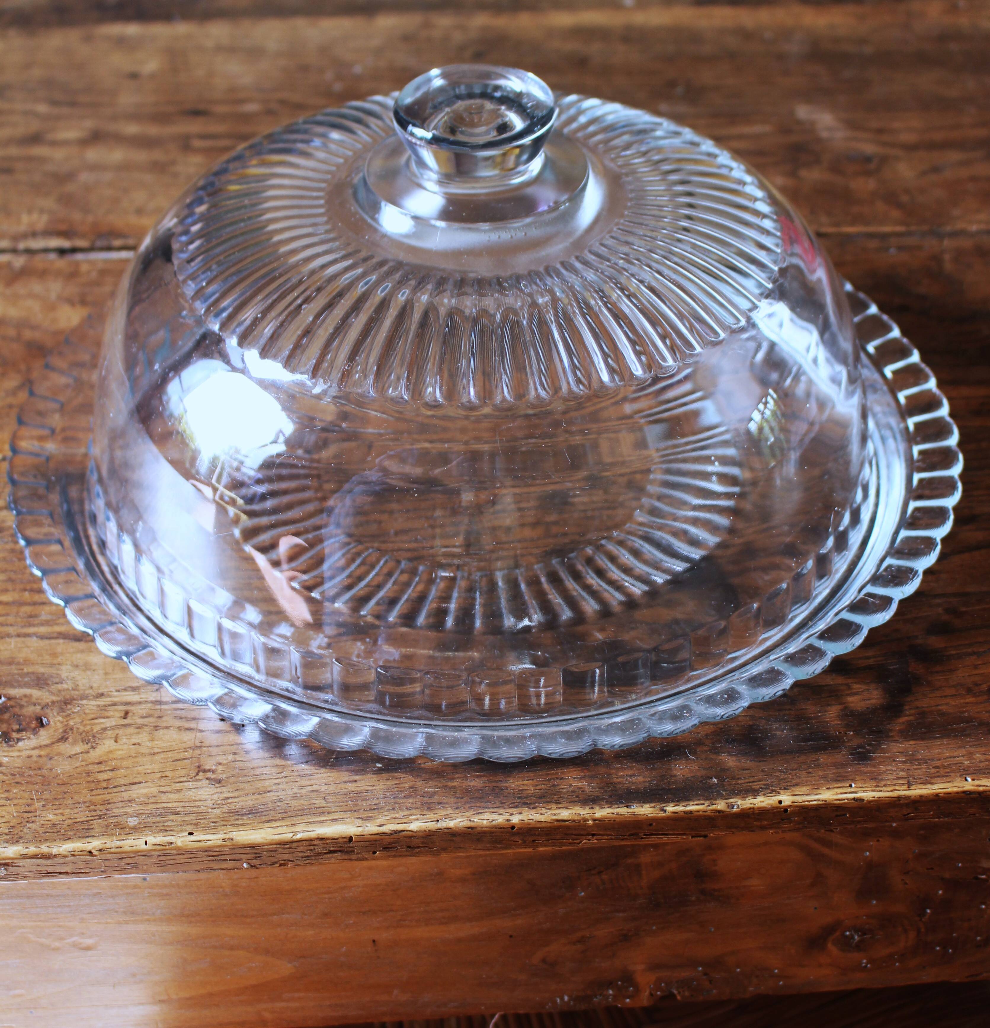 Large glass bell jar and its vintage cheese dessert plate.