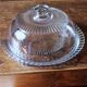 Large glass bell jar and its vintage cheese dessert plate.