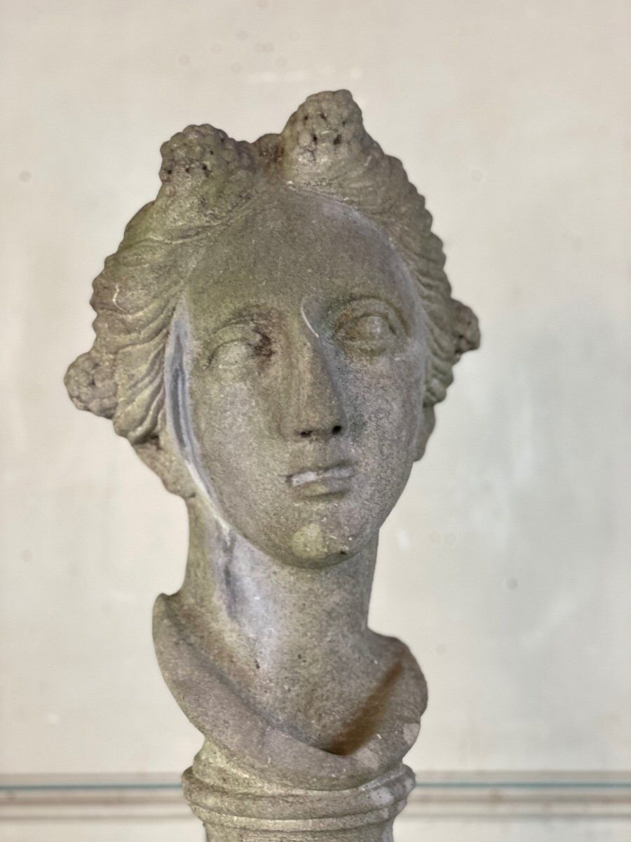 Female bust sculpted in stone