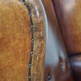 Sheepskin leather chair with a beautiful patina