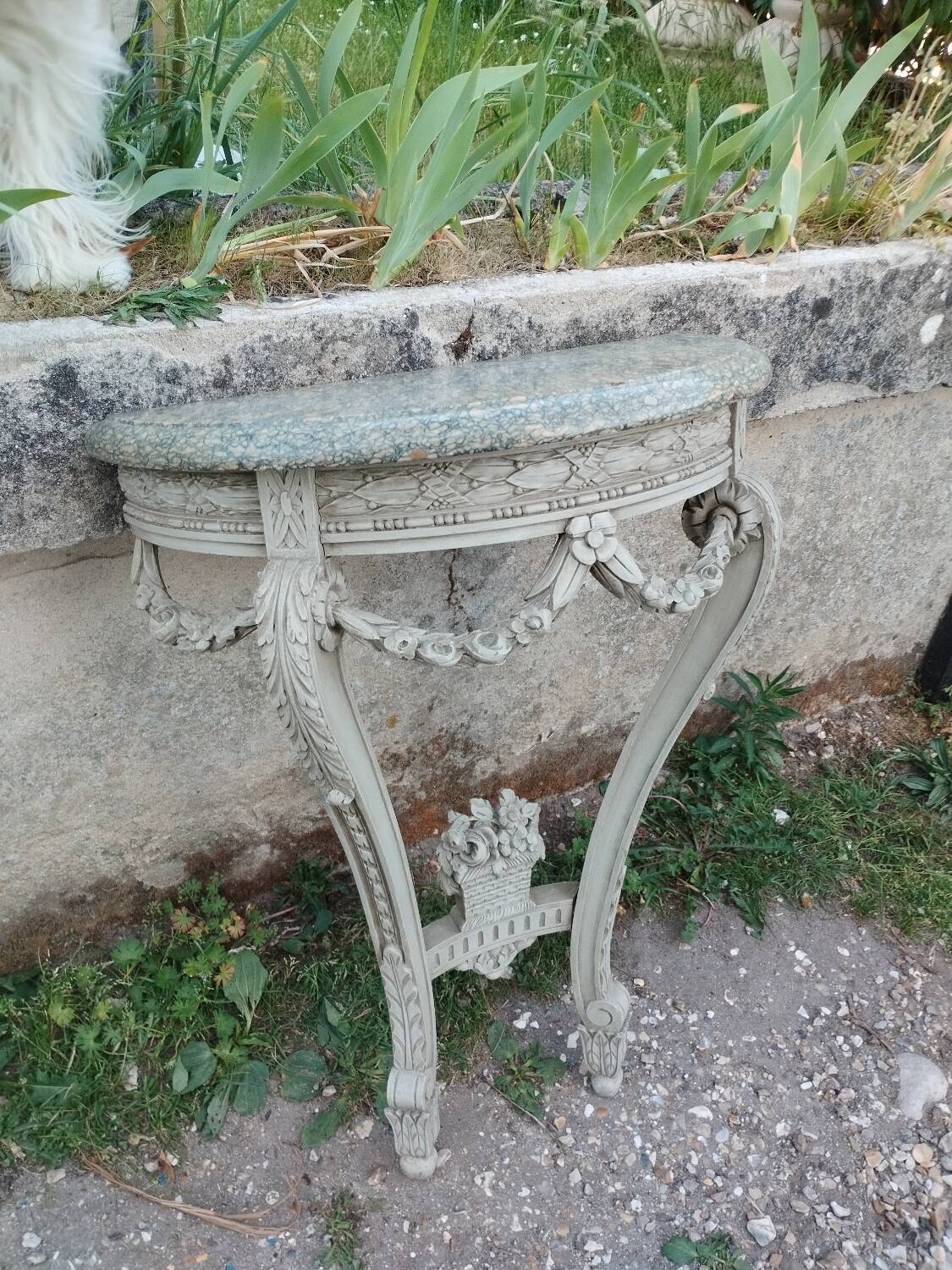 Beautiful antique wooden console with a marble top in Louis XVI style.