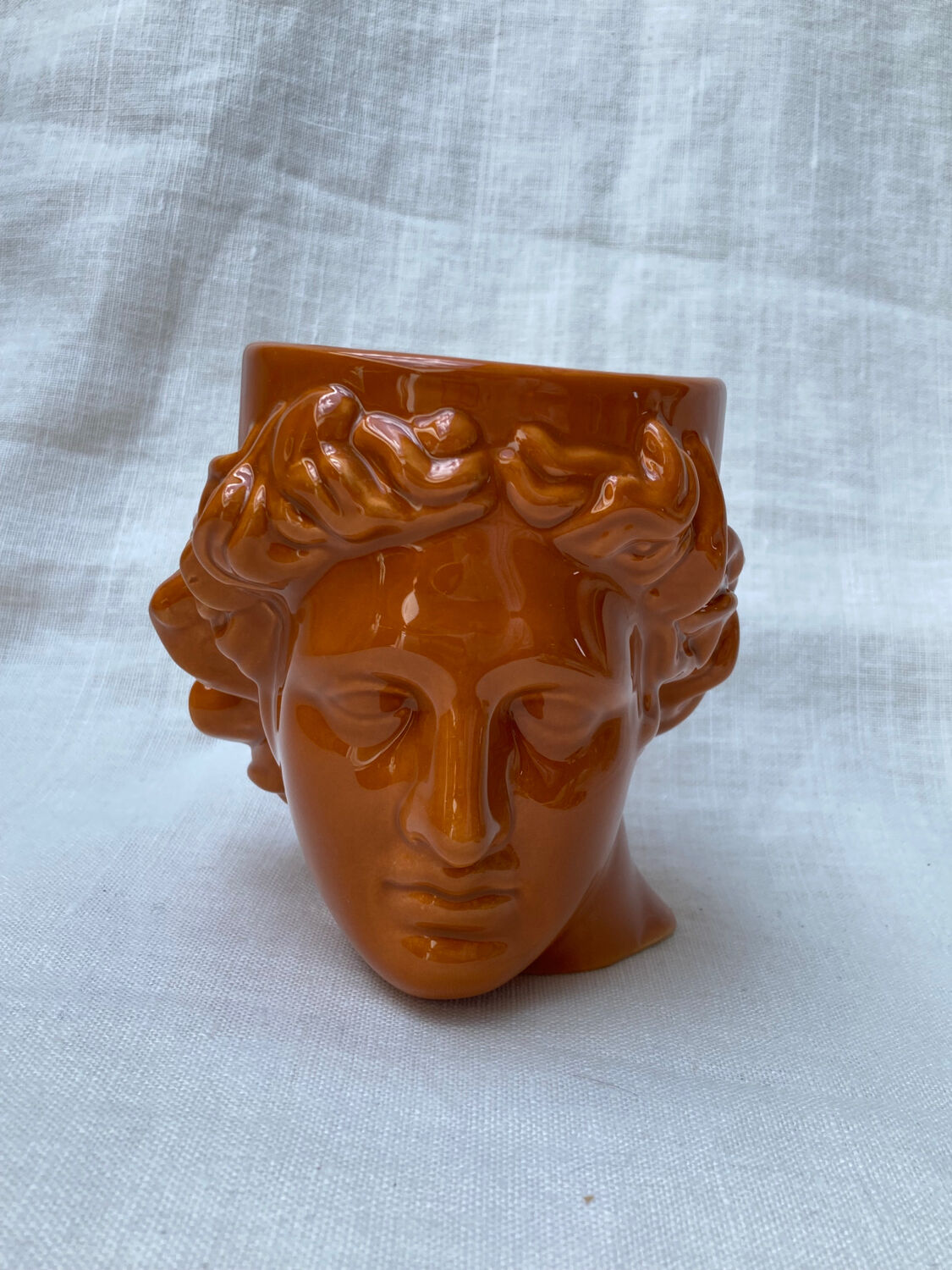 Roman head cup