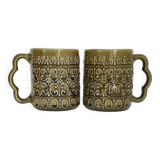Duo of BP 70's slip mugs