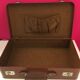 Set 2 vintage suitcases in vulcanized fiber and leather