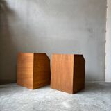 Pair of handcrafted solid wood bedside tables with drop-down doors.