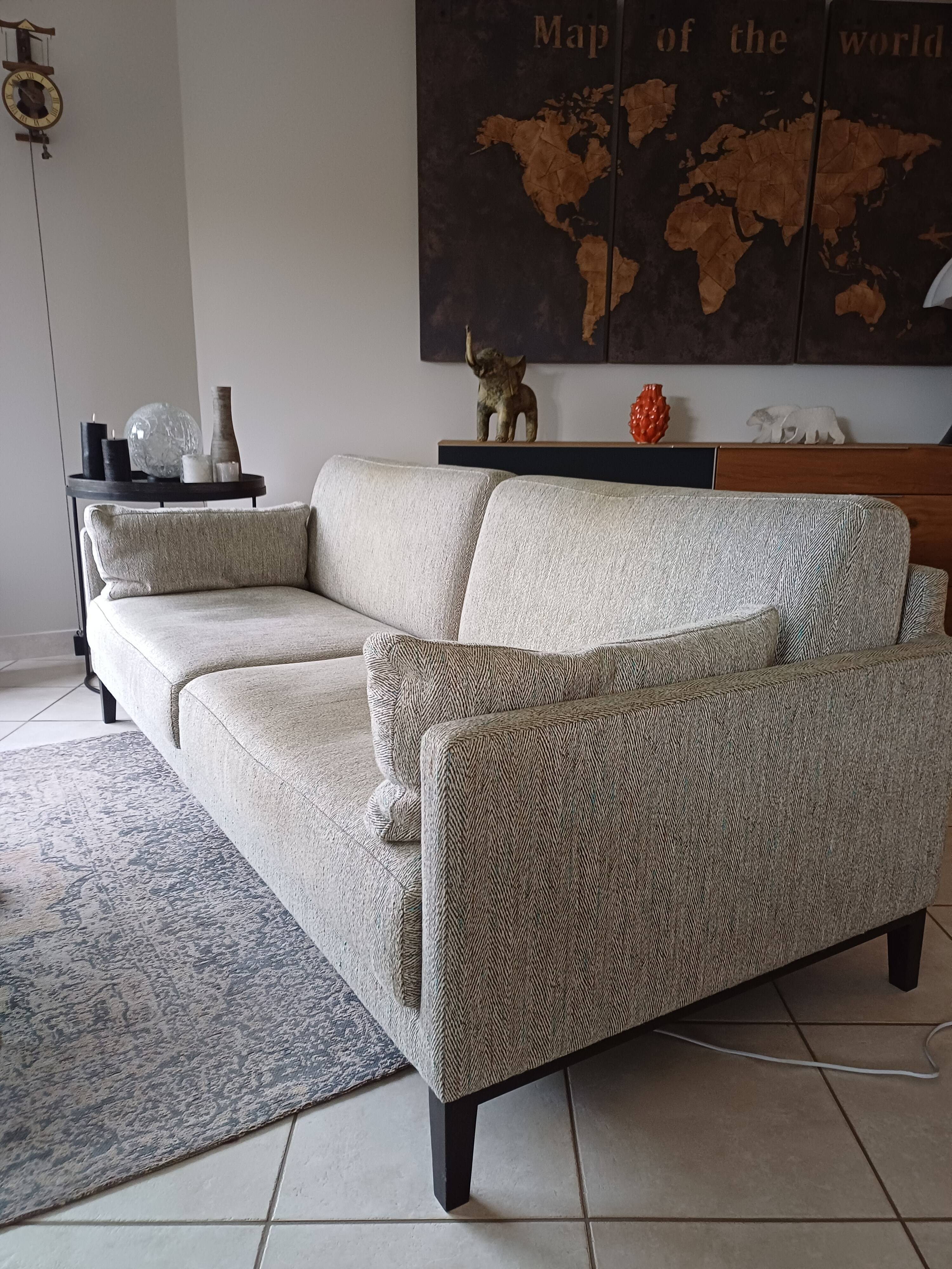 Duvivier canapé 104 Mayenne Alaska pebble fabric and its headrests.