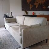 Duvivier canapé 104 Mayenne Alaska pebble fabric and its headrests.