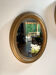 Miroir ovale en bois doré, style Napoléon III