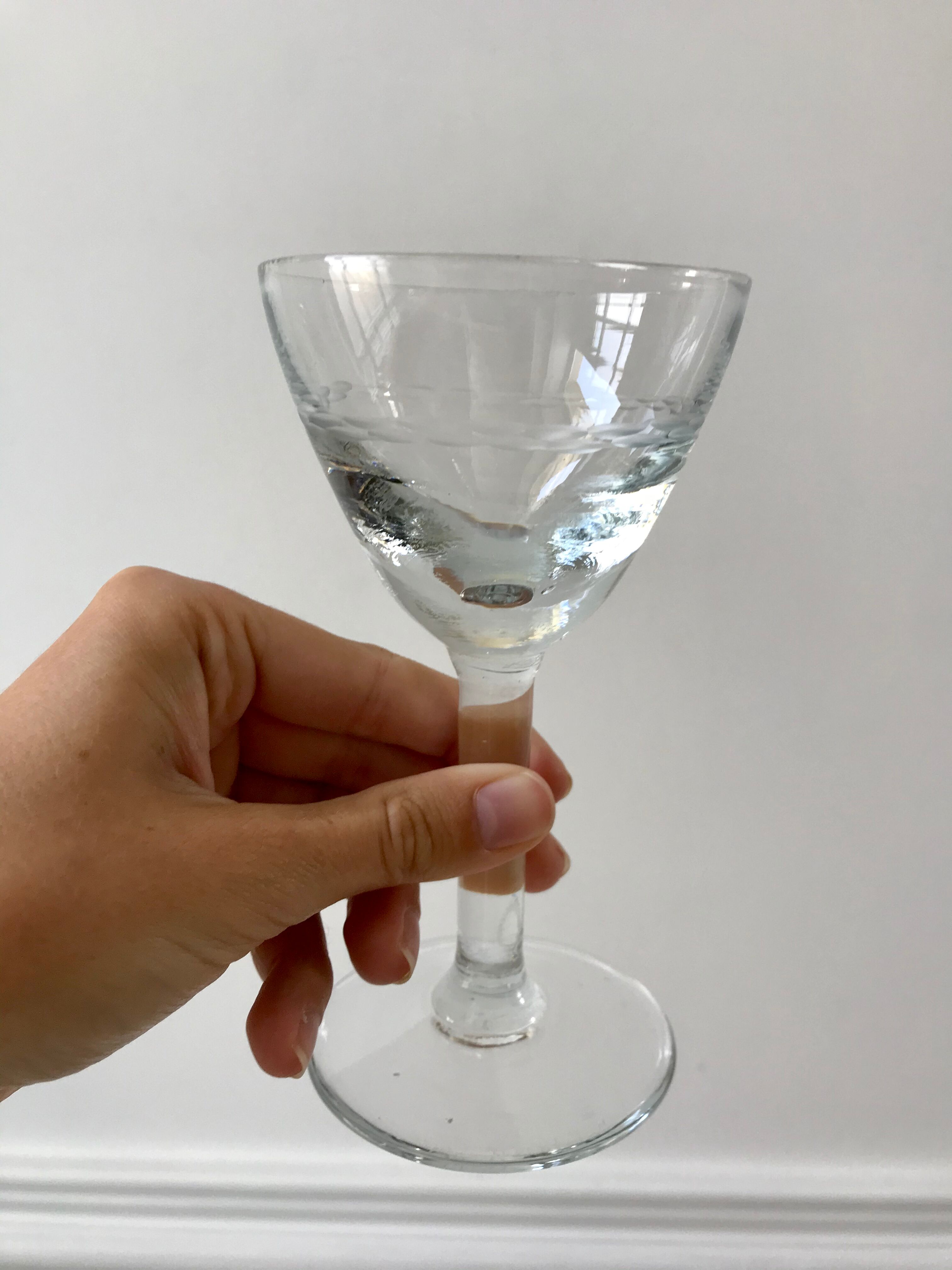 Set of 11 molded glass wine glasses engraved 20s