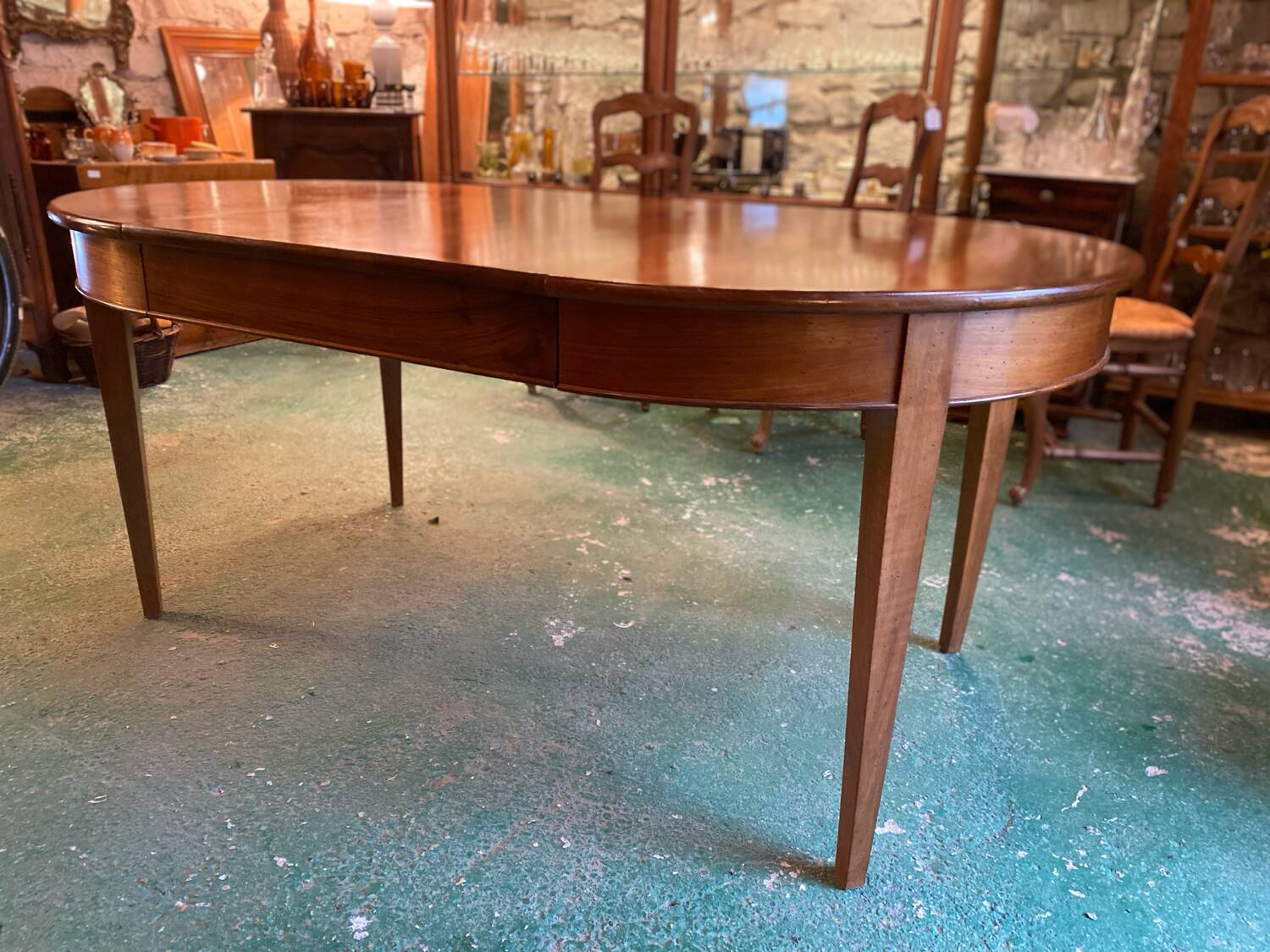Louis XVI style oval walnut extendable table