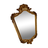 Miroir en bois doré décoré