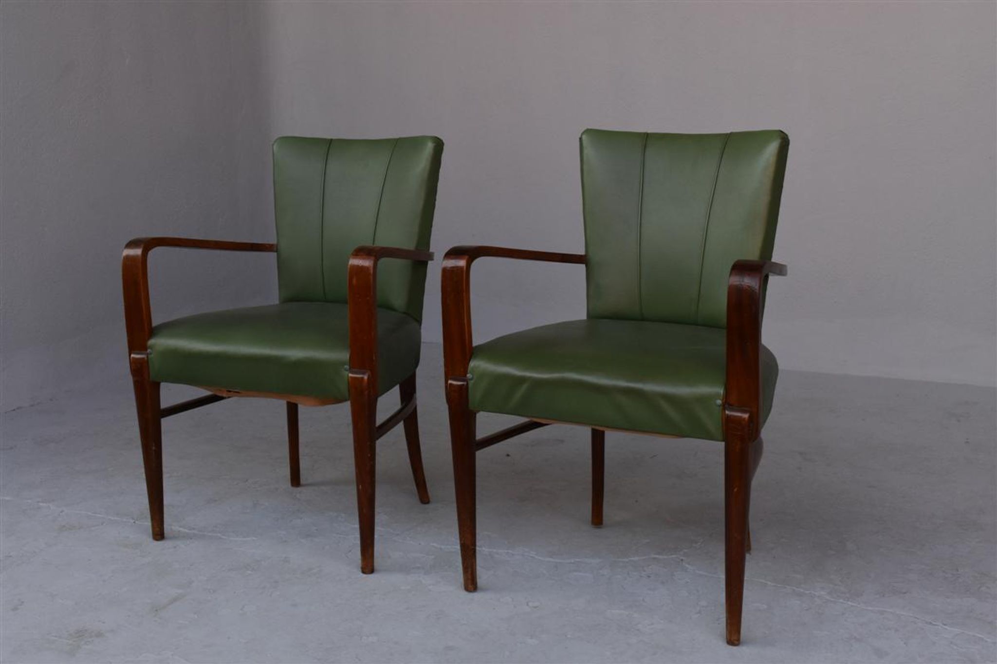 Pair of 1940 in green leatherette and beech chairs