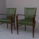 Paire de fauteuils 1940 en skaï vert et hêtre