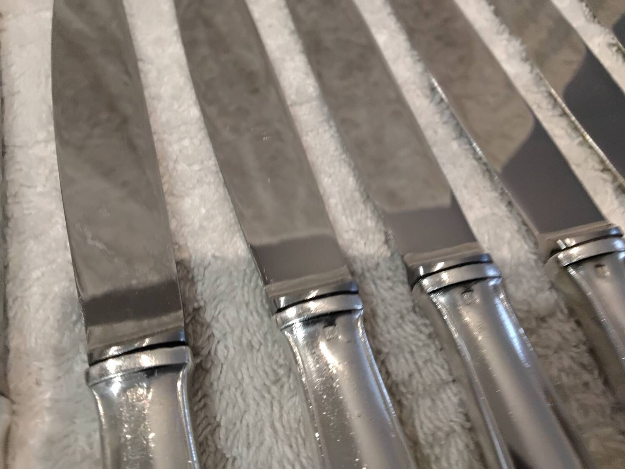 12 silver-plated dessert knives by Platil, rocaille style