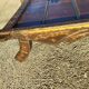 Coffee table in metal and copper wood