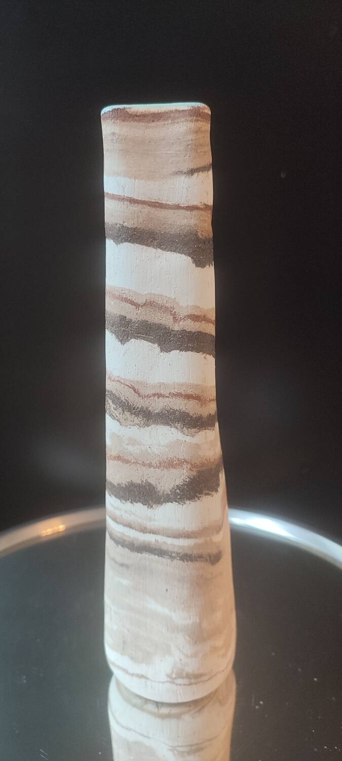 Turned stoneware vase signed with relief decoration.
