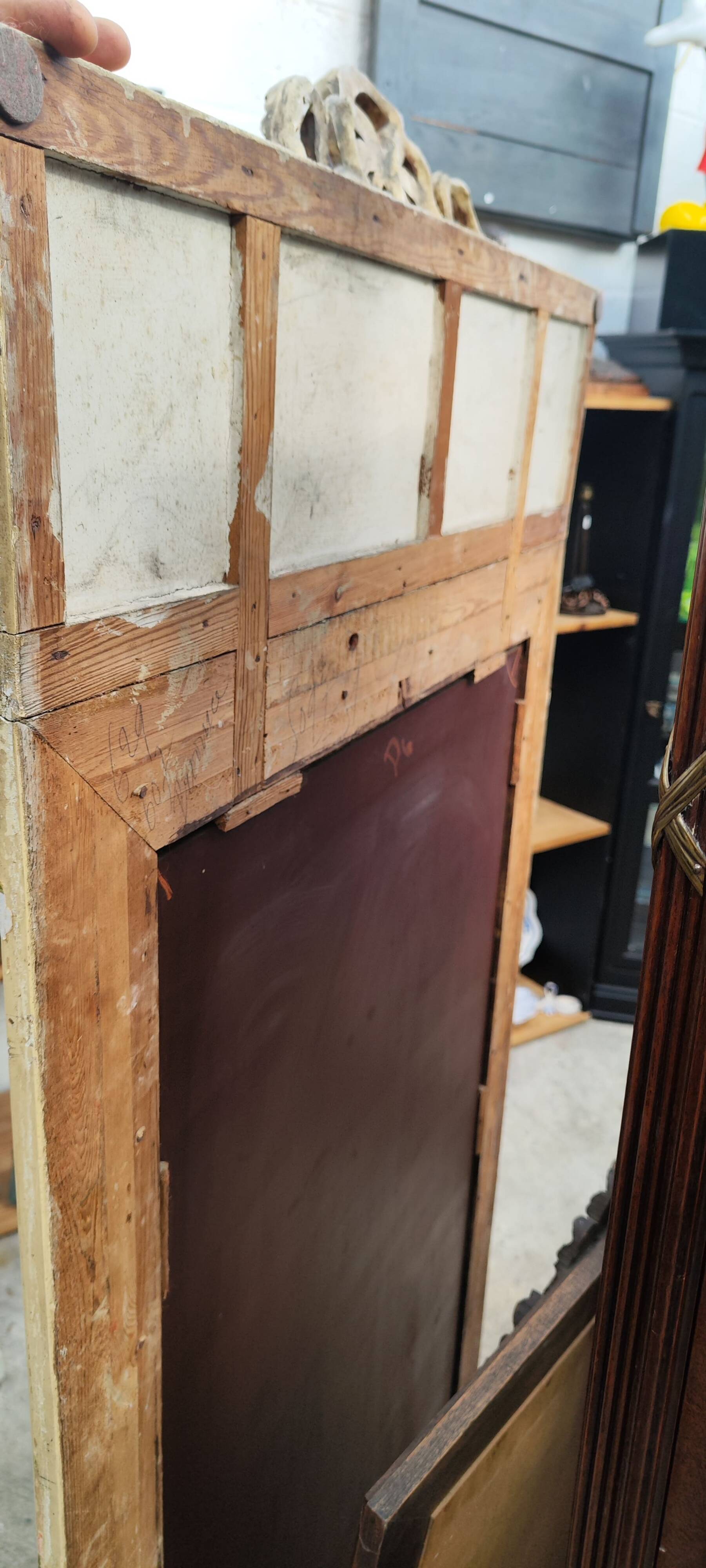 Old large Louis XVI style trumeau mirror with pediment and floral basket knot