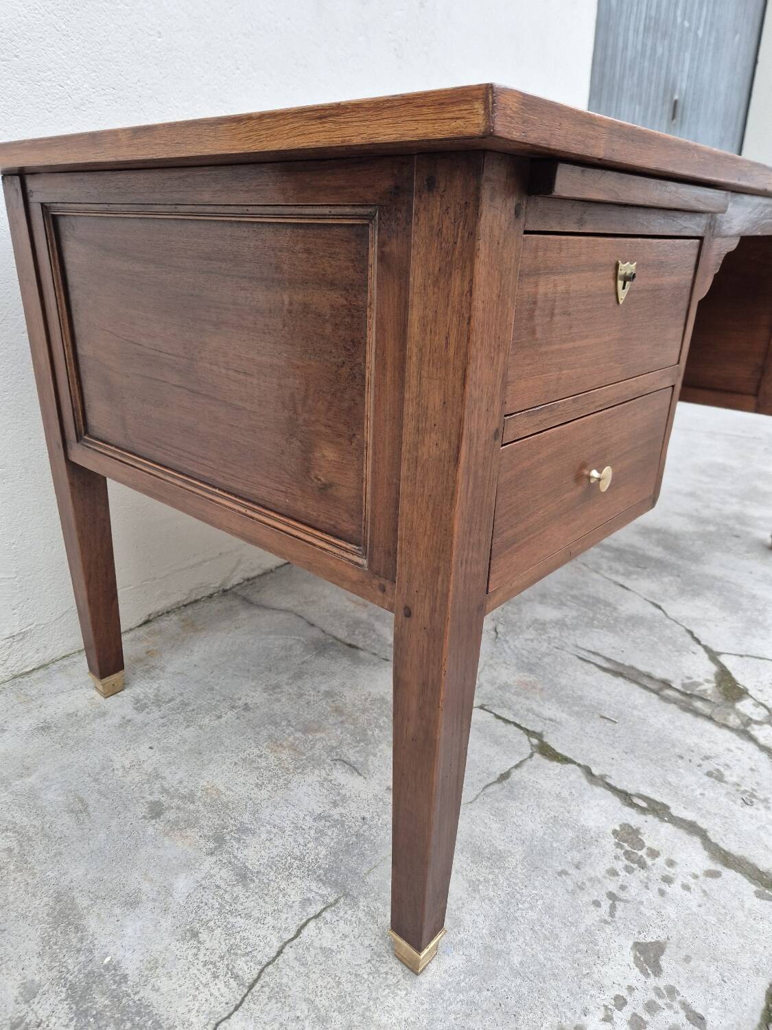 Louis XVI style minister's desk in solid walnut, 4 drawers, old manufacture