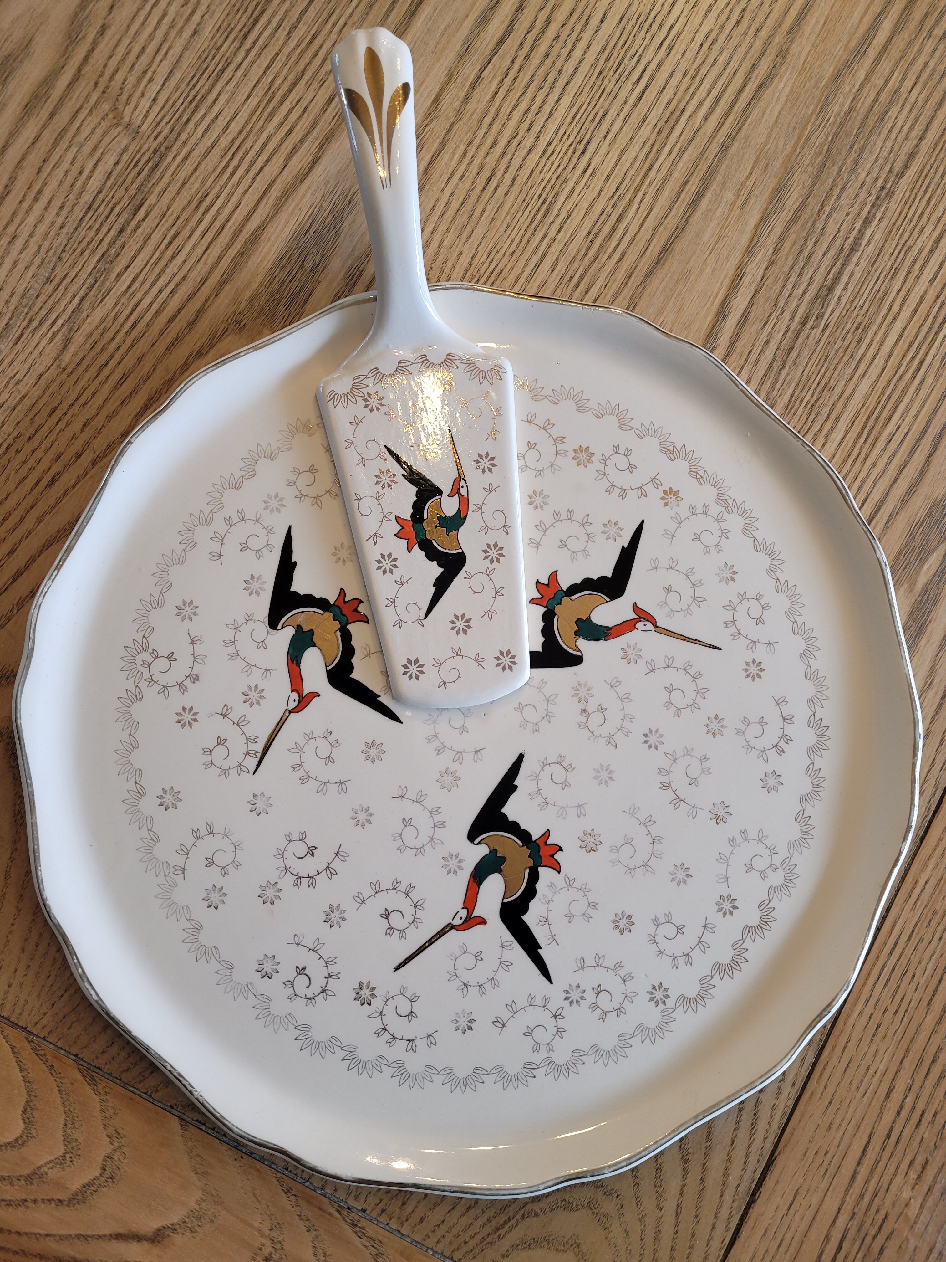 Longwy flat and porcelain pie shovel stork pattern